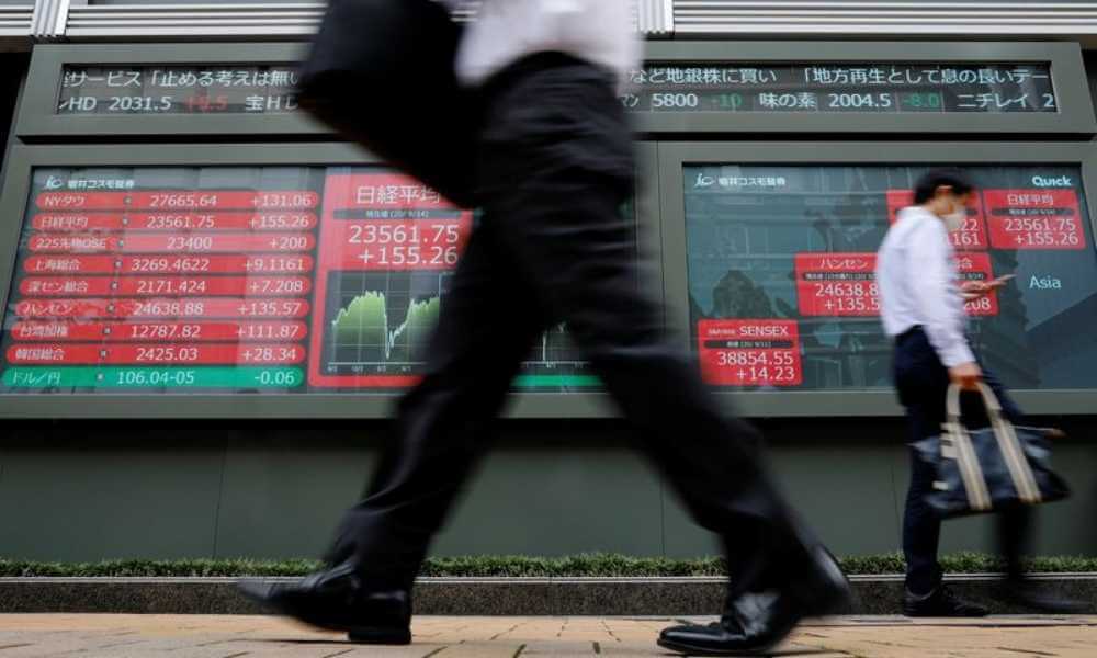 Asia stocks hit 3-week top, dollar struggles